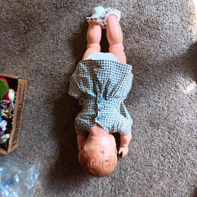 LARGE VINTAGE DOLL AND A WOODEN DISPLAY SLED