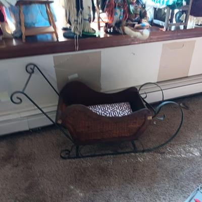 LARGE VINTAGE DOLL AND A WOODEN DISPLAY SLED