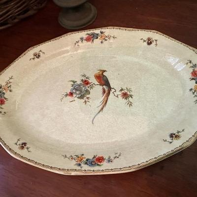 STRAW BASKET, PEACOCK PLATTER, PITCHER, ANDTIQUE PHOTO ALBUM & CANDLE LIGHT