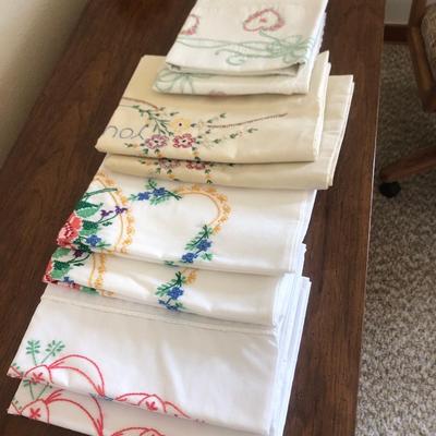 8 Embroidered pillowcases