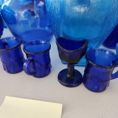 Large Lot of Blue Glassware Vases , Owl Pitcher, and others