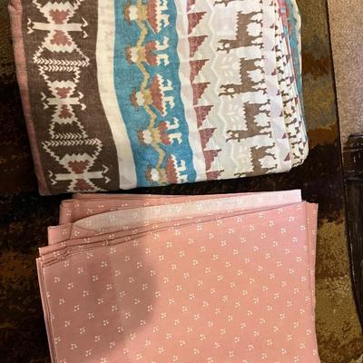 Assorted fabrics and bedding