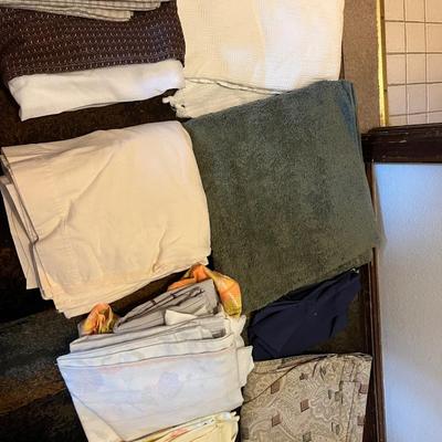 Assorted fabrics and bedding