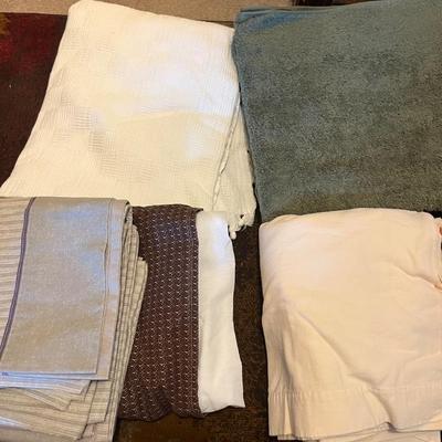 Assorted fabrics and bedding