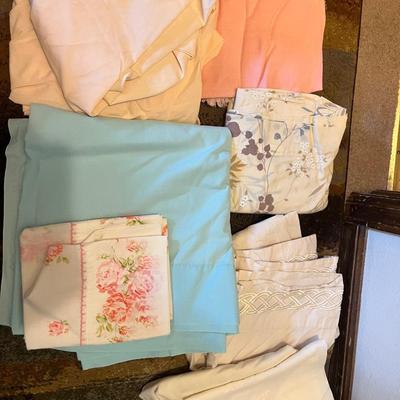 Assorted fabrics and bedding