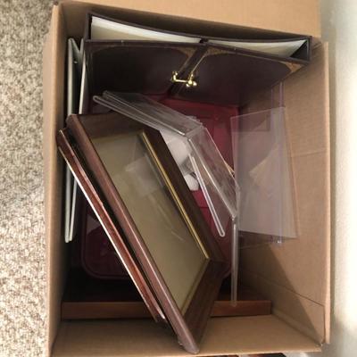 Box of photo frames and albums