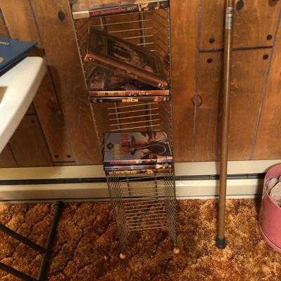 DVD stand and seven DVDs