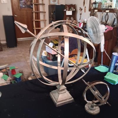 2 STEEL ARMILLARY SPHERES WITH ARROWS
