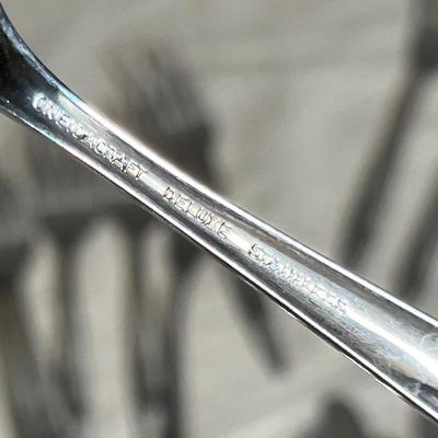 Lot 276 Stainless flatware
