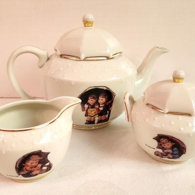 Lot #256 Hummel/Danbury Mint Umbrella Boy/Girl Tea Set