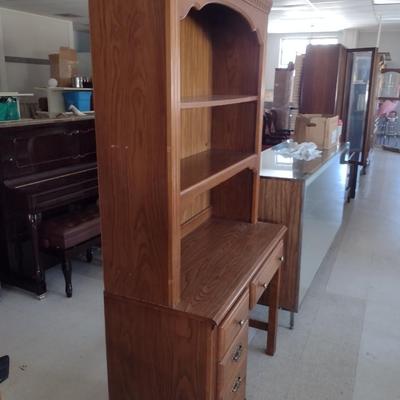 Sale Photo Thumbnail #1420: Broyhill Wood Finish Two Piece Knee Hole Desk with Bookshelf Topper.  Please see all pictures- item has de-lamination and some damage to finish.