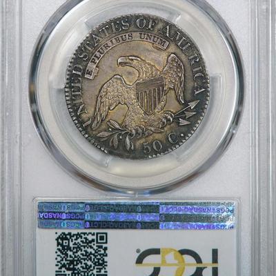 1825 PCGS MS63 Bust Half, soft satiny luster beneath old antique looking patina