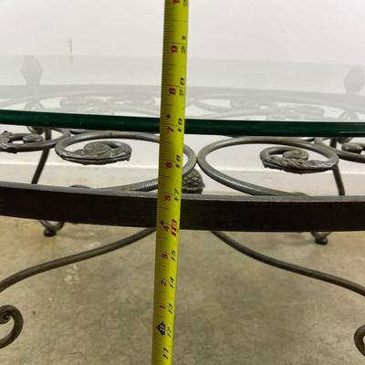 Oval Glass Top Coffee Table with Scrolling Metal Base