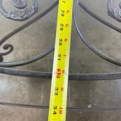 Oval Glass Top Coffee Table with Scrolling Metal Base