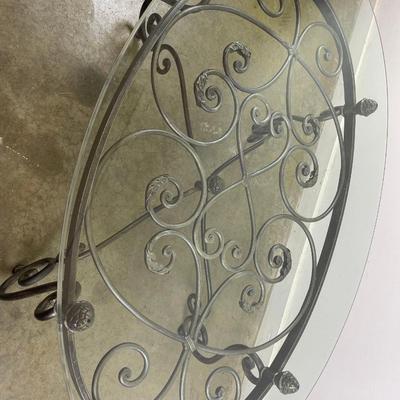 Oval Glass Top Coffee Table with Scrolling Metal Base