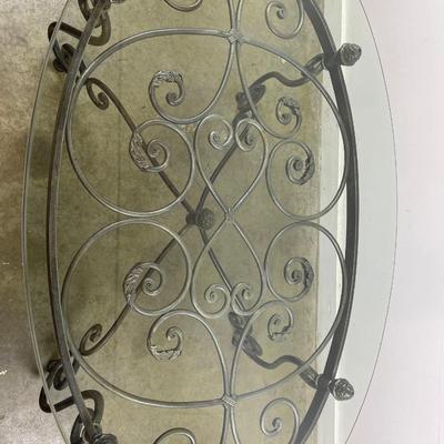 Oval Glass Top Coffee Table with Scrolling Metal Base
