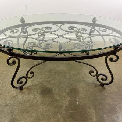 Oval Glass Top Coffee Table with Scrolling Metal Base