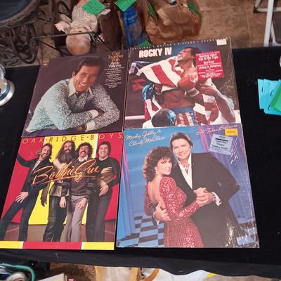 4 VINYL RECORDS