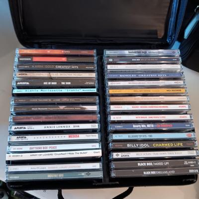 MUSIC ON CD's IN A CARRY CASE (2)