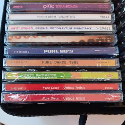 MUSIC ON CD's IN A CARRY CASE (3)