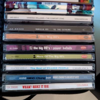 MUSIC ON CD's IN 2 CARRY CASES (1)