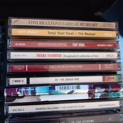 MUSIC ON CD's IN 2 CARRY CASES (1)