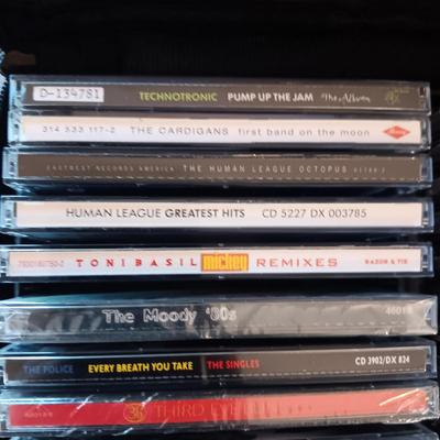 MUSIC ON CD's IN 2 CARRY CASES (1)