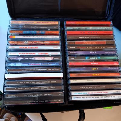 MUSIC ON CD's IN 2 CARRY CASES (2)