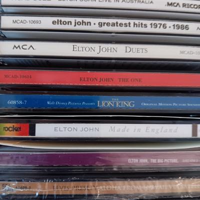 MUSIC ON CD's IN 2 CARRY CASES (2)