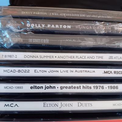 MUSIC ON CD's IN 2 CARRY CASES (2)
