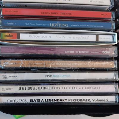 MUSIC ON CD's IN 2 CARRY CASES (2)