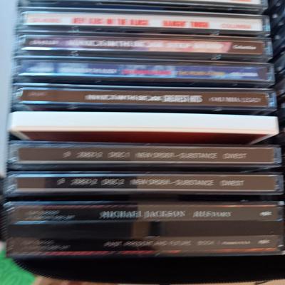 MUSIC ON CD's IN 2 CARRY CASES (2)