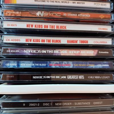 MUSIC ON CD's IN 2 CARRY CASES (2)