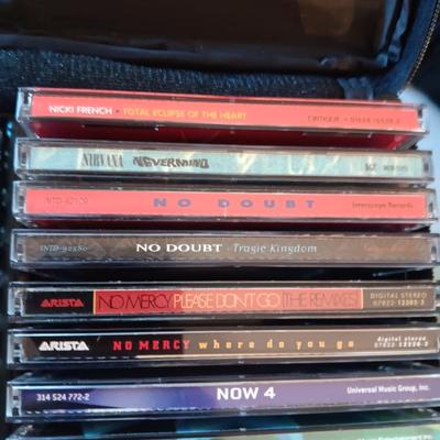 MUSIC ON CD's IN 2 CARRY CASES (2)