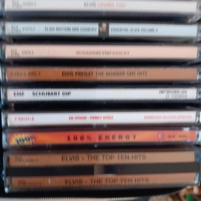 MUSIC ON CD's IN 2 CARRY CASES (2)