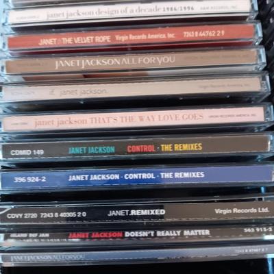MUSIC ON CD's IN 2 CARRY CASES (1)