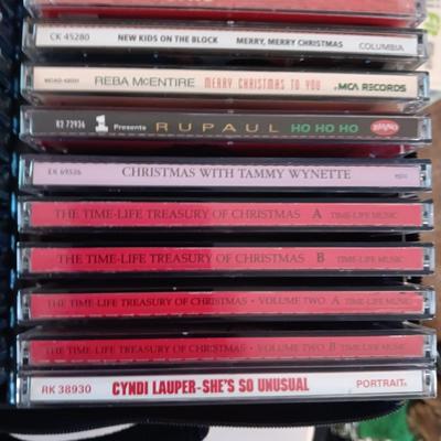 MUSIC ON CD's IN 2 CARRY CASES (1)