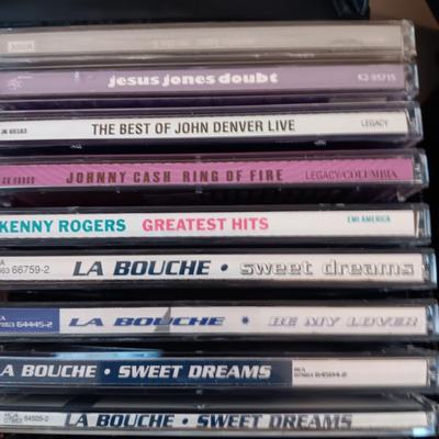 MUSIC ON CD's IN 2 CARRY CASES (1)