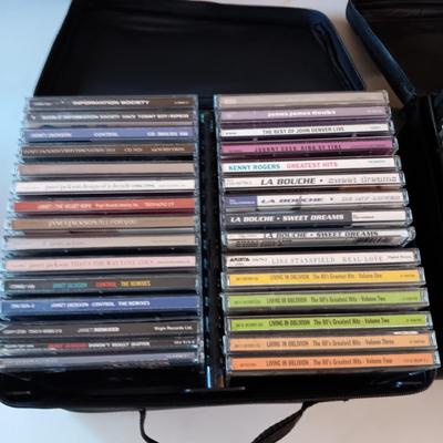 MUSIC ON CD's IN 2 CARRY CASES (1)