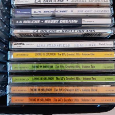 MUSIC ON CD's IN 2 CARRY CASES (1)