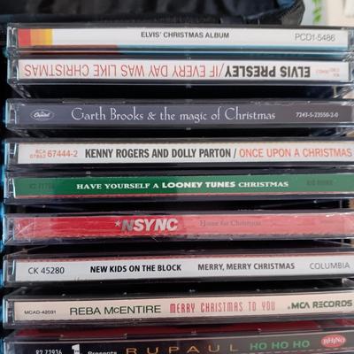 MUSIC ON CD's IN 2 CARRY CASES (1)