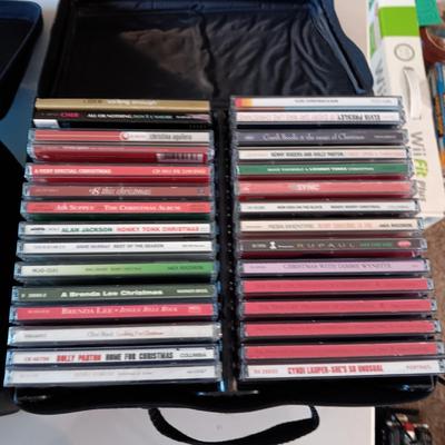 MUSIC ON CD's IN 2 CARRY CASES (1)