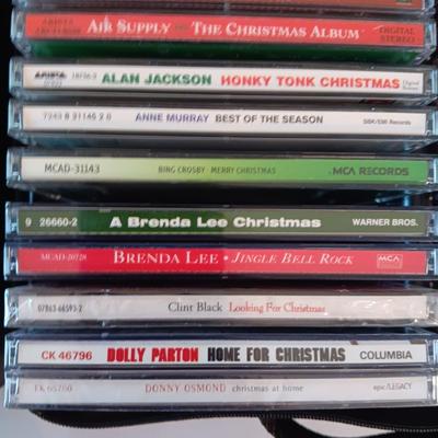 MUSIC ON CD's IN 2 CARRY CASES (1)