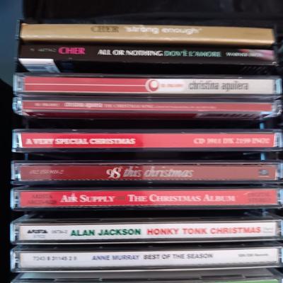 MUSIC ON CD's IN 2 CARRY CASES (1)