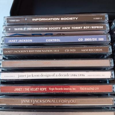 MUSIC ON CD's IN 2 CARRY CASES (1)