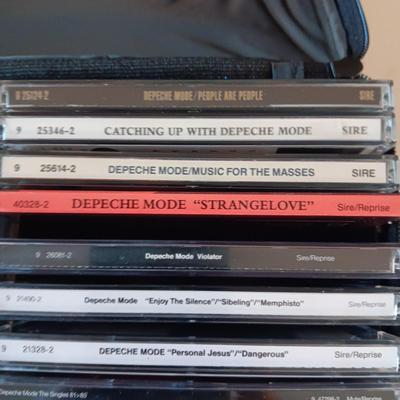 MUSIC ON CD's IN 2 CARRY CASES (4)