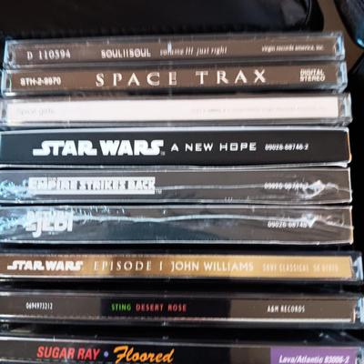 MUSIC ON CD's IN 2 CARRY CASES (4)