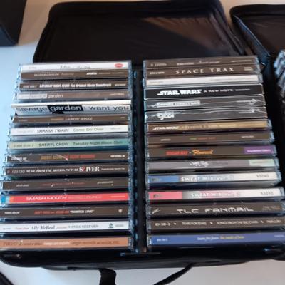 MUSIC ON CD's IN 2 CARRY CASES (4)