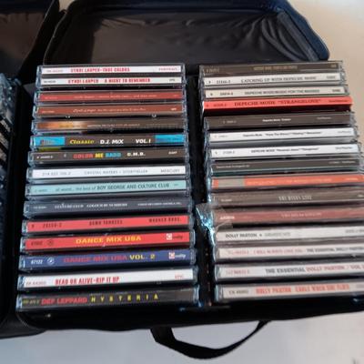MUSIC ON CD's IN 2 CARRY CASES (4)