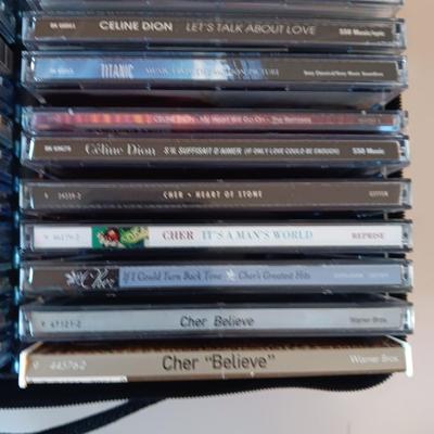 MUSIC ON CD's IN A CARRY CASE PLUS JOHN DENVER 4 DISC SET